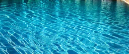 the rippled surface of the water in a pool, just the water
