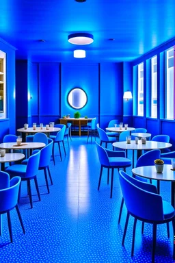 A restaurant with blue walls, a white floor, and an oval-shaped table in the middle of the restaurant with 30 chairs