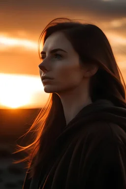 a female model looking dramatically at the sunrise