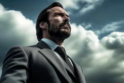 a muscular man who looks like Hans Gruber looks upward at a cloudy sky, film noir