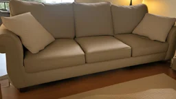 brand new couch taken apart in living room