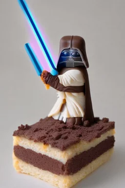 sponge cake filled with chocolate topped with a marzipan Jedi holding a lightsaber