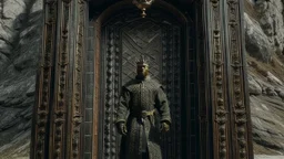 black king stands in front of huge door in mountain