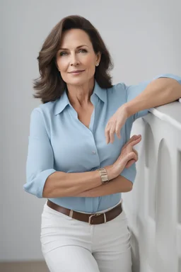A powerful woman in a light blue blouse, in her 40s