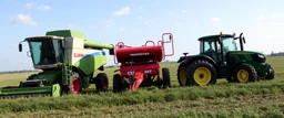 Parked at the edge of a field is a Claas brand Combine(left) Vaderstad implement Seeder(middle, red) and a John Deere Tractor(right) simplified