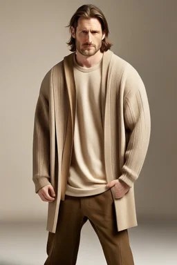 Man's large and long and beige knitted jumper opened on front in square shape