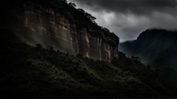 flat wall of rock in the jungle at the foot of the mountain