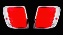 2 vehicle taillight(with chrome trim) on black background, add details and inner glow