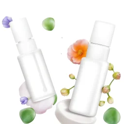 a bottle for cosmetics and a cream jar lies on a beautiful floral background top view, in the background there are beautiful spring flowers and a drop of cream, high-quality picture, top view