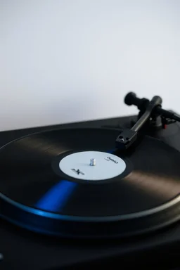 turntable playing white label vinyl