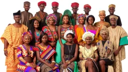 Nigerians from different ethnic and tribal groups posing for a picture dressed in the ethnic attire