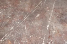 scratched garage floor, from low perspective