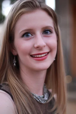 young blonde woman with dark green eyes