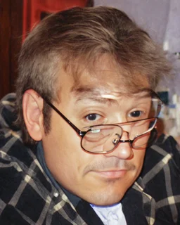 man wearing glasses in a pixar style