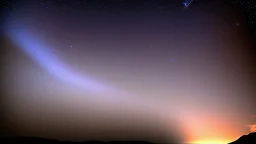 comet crosses the night star lit sky