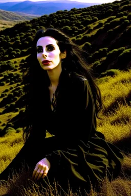 Diamanda Galas playing on a hillside