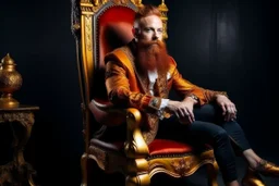 man with red beard sitting in a gothic armchair, golden armrests with trim