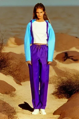 year 1994 women fashion. Karjalainen kuvio, Karjala, "summer combat suit trouser" with low waist, baggy, Combat pants, t-shirt and interesting hoodie with high tippet integrated to bolero. Colors: denim blue, blue, purple, khaki, "pastel light green", lilac, plum, orange, terracotta, red, pink, dark blue, beige. Women models. Starling pattern prints.Jennifer Lopez, Gwyneth Paltrow, . Big tennis shoes on. Cargo pants.