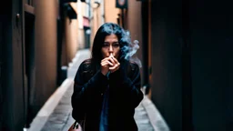 Woman smoking a ciguarete in a narrow lonely dark ally