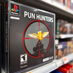 close up on a Playstation video game case on display on a store shelf for game titled "PUN HUNTERS", game case image is a pixelated video game image of a red sniper crosshair zeroing in on an anthropomorphic butter stick with wings, rated M for mature, original playstation game box satire,