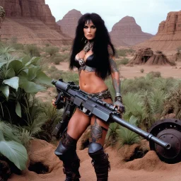 tattooed Julie Strain in action, standing in the middle of the badlands jungle surrounded by luxuriant flora - Heavy Metal F.A.K.K.2 her machine-gun in hand (shot from The Dark Crystal, 1982 dark fantasy film directed by Jim Henson and Frank Oz)