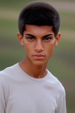 Appearance: Ari has a mixed-race skin tone with a light brown complexion. He has dark hair in a page boy haircut, and his hair length could be somewhere in-between long and short. His face is thin with high cheekbones and dark eyes that are often full of emotion. He stands at around 5 feet 7 inches tall, with a lean build that suggests he doesn't engage in a lot of physical activity. He is of average attractiveness with a boyish face.