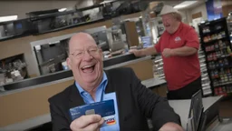 ron the evil credit card scammer laughing at the victim