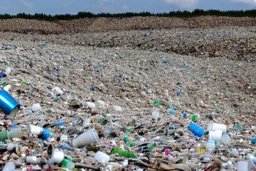 A photo of a landfill or waste disposal site to represent the issue of non-recyclable filters.