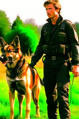 John Connor from the movie Terminator with a German Shepherd on a leash.