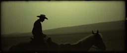 John Atkinson Grimshaw 19th-century gothic photography, Zdzisław Beksiński surrealism, Caravaggio chiaroscuro, tactile analog grain, pinhole-camera softness, heavy vignetting, scratched emulsion, rugged irregular photo border. SCENE: alien cowboy, completely absorbed in the mundane task.