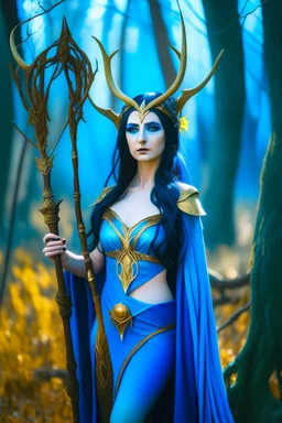 A picture of a beautiful blue faced Korean goddess with skin painted blue, blue body, blue torso, wild black hair, stag antlers, elven ears, golden skirt, holding a staff in a sunny forrest