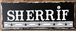 large and wide hand painted old western sign that reads: "SHERRIF" white on black with inset boarder stripe in white