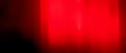 streaks of light in the background, red tones, dark background