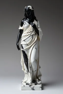 photo of a lady statue made of white marbel with black parts