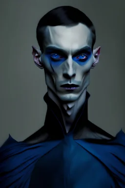 thin pale man with black eyes wearing expensive dark blue costume