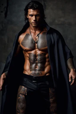 Alpha Marius shirtless and his muscular chest is covered in tattoos, but it’s his eyes that draw me in. Dark grey and stormy.