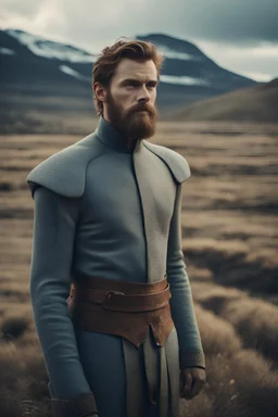 ultra realistic cinematic scene of fictional-Oscar winning historical drama young handsome beard Actor wears LARRY BELL 3D-printed tight-fitting costume, film grain, cinematic color grading, detailed face, dramatic lighting, icelandic landscape, directed by Stanley Kubrick