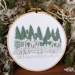 exquisite whimsical snowy forest in embroidery hoop, intricate, highly detailed, linen and wood backdrop