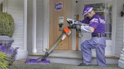 fedex driver with a chainsaw at the front door