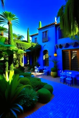 The Jardin Majorelle in Marrakech, an oasis of calm amid the city's chaos. This enchanting garden is filled with exotic plants, vibrant blue buildings, and winding pathways.