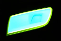 vehicle headlight(with chrome and neon green trim) on black background