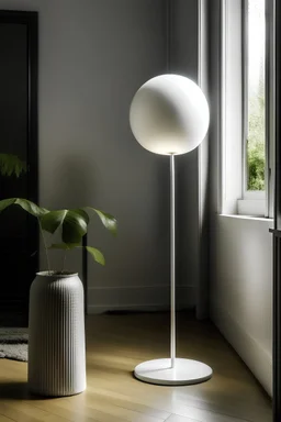 Floor lamp with a metalic base lamprod and a white sphere lampshade