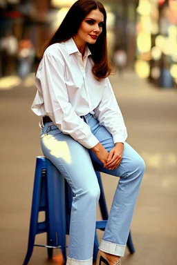 Pretty woman sitting on a stool, wears hunge open white shirt and blue jeans