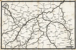 an ancient printed road map that was black and white, but has since been stained and weathered, text uses Cree syllabic symbols