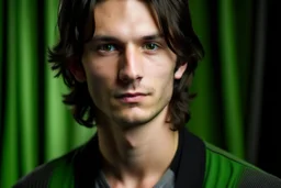 a young male with shoulder length black hair and green eyes, slight smile