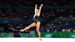 Please provide a detailed Photo of a female gymnast performing her routine on the floor exercise at the Olympic Games. Include specific elements of her performance, such as her choreography, the difficulty of her moves, her artistry, and how she engages the audience. Additionally, describe the atmosphere of the event, the reactions of the crowd, and any notable aspects of her presentation. The output should be structured in a way that captures the excitement and technical skill of the performanc