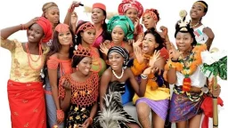 Nigerians from different ethnic and tribal groups posing for a picture dressed in the ethnic attire