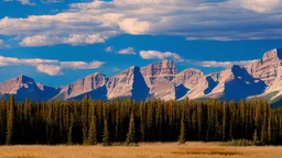 rocky mountains behind the Alberta prairie