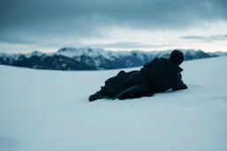 in the distance a figure in dark clothes and long black leather coat lies on his back in the snow and looks the sky in a winter landscape, alone, white snow, high contrast, cold, winter, mountains, white, blue, gray and black colors, cinematic, atmospheric, dark, gloomy, best shot