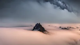 looking up at misty foreground and night sky background, no sun, single sharp narrow mountain peak coming through the mist in the center